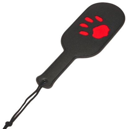 Puppy paddle with paw print imprint, available in red or black. Perfect for BDSM impact play and pup play enthusiasts. Keywords: puppy paddle, BDSM impact play paddle, paw print paddle, pup play gear, Prowler RED paddle, red paw print paddle, black paw print paddle, BDSM accessories, pup play fetish paddle, durable impact paddle, beginner-friendly BDSM gear.