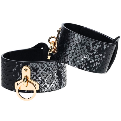 The Florence Iridescent Snake BDSM Ankle Cuffs by Ouch! feature bonded leather, gold-tone hardware, and adjustable straps for stylish and functional restraint.