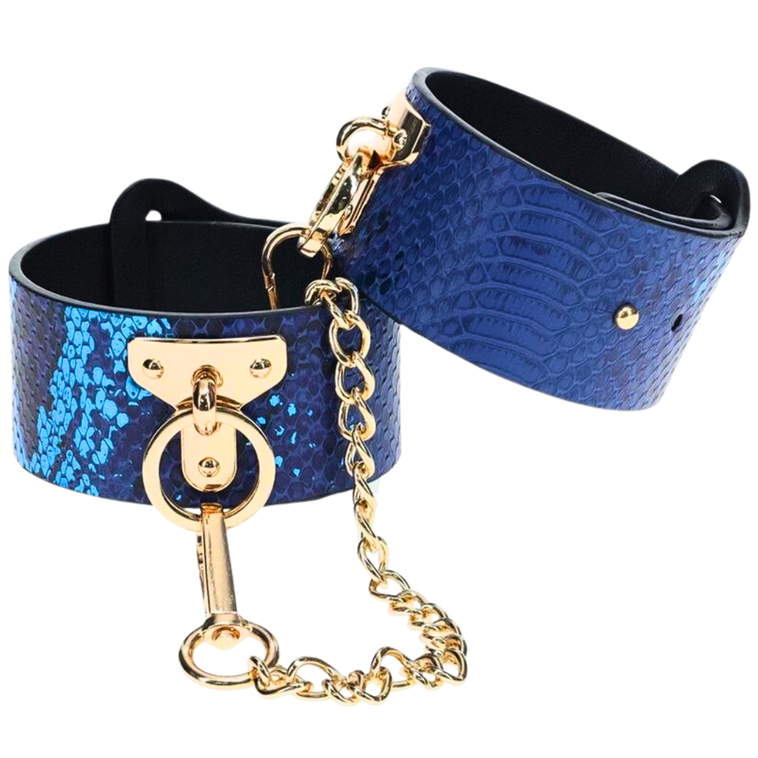 The Florence Iridescent Snake BDSM Ankle Cuffs by Ouch! feature bonded leather, gold-tone hardware, and adjustable straps for stylish and functional restraint.