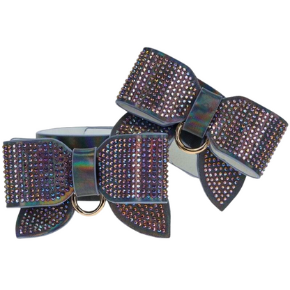 Adjustable ankle cuffs with rhinestone bows and gold chain leash, available in iridescent black, pink, and blue for stylish BDSM play.