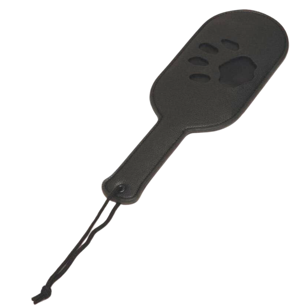 Puppy paddle with paw print imprint, available in red or black. Perfect for BDSM impact play and pup play enthusiasts. Keywords: puppy paddle, BDSM impact play paddle, paw print paddle, pup play gear, Prowler RED paddle, red paw print paddle, black paw print paddle, BDSM accessories, pup play fetish paddle, durable impact paddle, beginner-friendly BDSM gear.