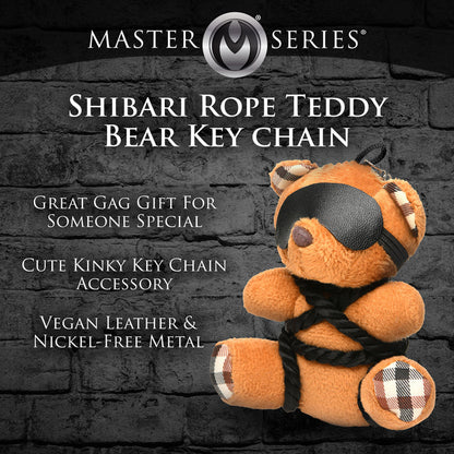 Burnt orange teddy bear keychain tied in silky rope bondage with a removable blindfold, a fun novelty accessory or gift.

shibari teddy bear keychain, rope bondage bear keychain, BDSM novelty gift, bondage bear keychain accessory, kinky teddy bear gift, burnt orange bear keychain, shibari rope bear, playful bondage bear keychain, BDSM-themed keychain gift, novelty shibari bear accessory