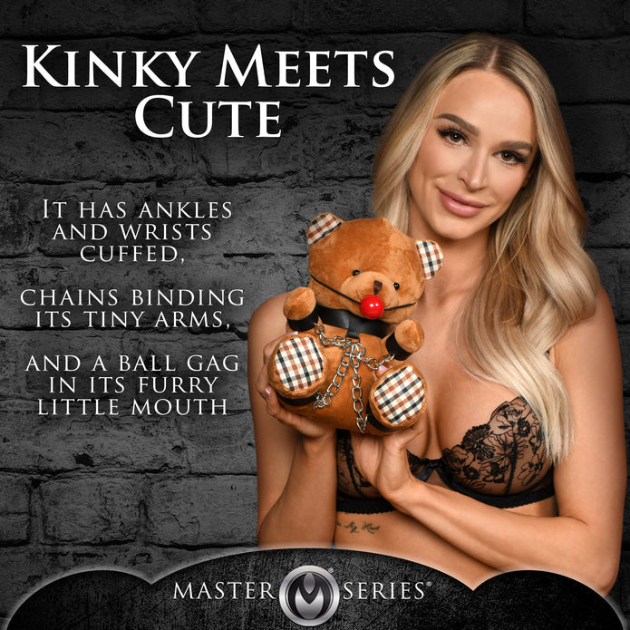 Restrained teddy bear with a ball gag, cuffs, and nickel-free chains—soft and cuddly with a playful BDSM theme.

