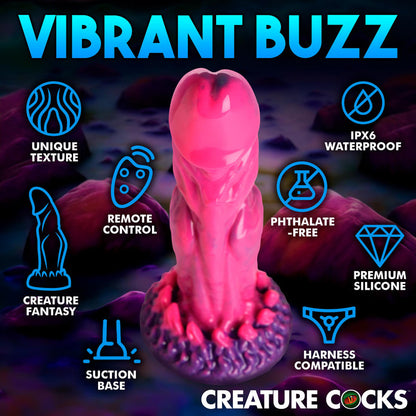 Alien-inspired vibrating dildo with remote control, premium silicone, suction cup base, and harness compatibility. Pink and purple design for fantasy play.

