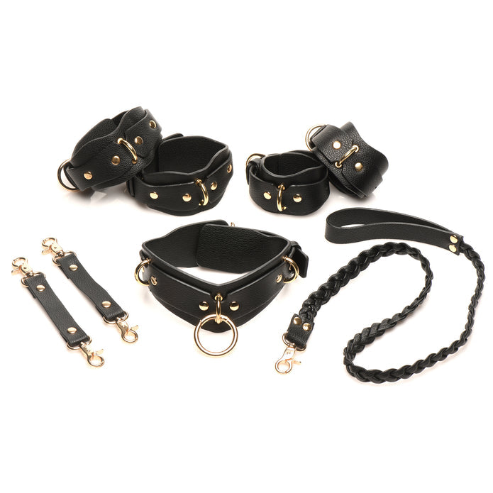 Vegan leather bondage set in black or red with gold accents. Includes cuffs, collar, leash, and connectors for versatile restraint play. Keywords: vegan leather bondage set, red and gold BDSM set, black and gold bondage set, adjustable BDSM cuffs, vegan leather collar, nickel-free bondage gear, braided leash BDSM, luxury bondage set, complete BDSM restraint kit, beginner-friendly bondage gear, stylish BDSM accessories.