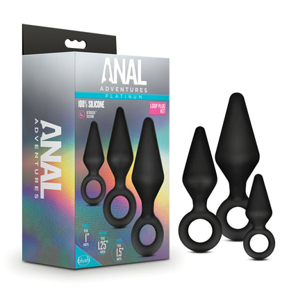 Anal Adventures Platinum Silicone Loop Plug Kit A product image of the Anal Adventures Platinum Silicone Loop Plug Kit by Blush Novelties. The packaging displays three black tapered plugs with loop bases in small, medium, and large sizes, made from 100% silicone with a smooth finish.