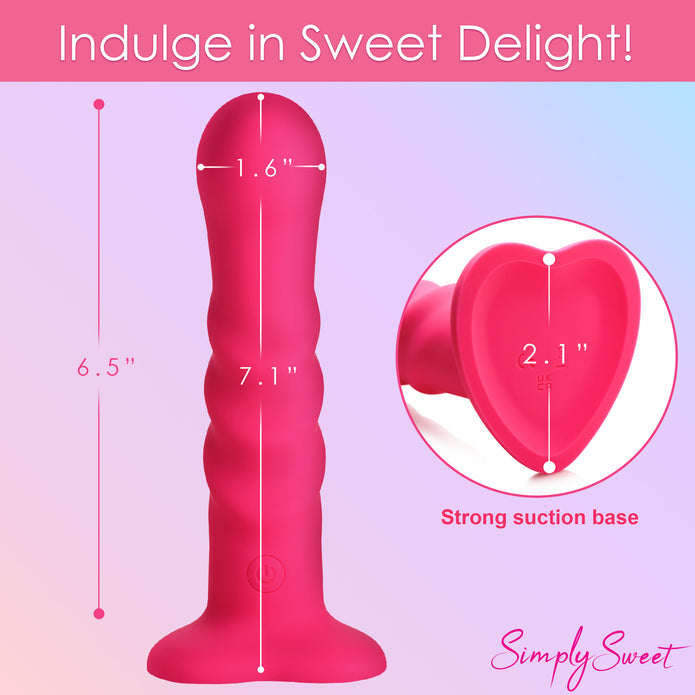 Enhance your playtime with the Simply Sweet Ribbed Dildo, featuring three textured ribs, 3 speeds and 7 patterns of vibration, and a remote control for effortless pleasure. Pink ribbed silicone dildo with vibrations, remote-controlled, harness-compatible suction base, waterproof, body-safe, phthalate-free. Keywords: pink silicone vibrating dildo, ribbed silicone dildo, G-spot vibrator, P-spot vibrator, harness-compatible dildo, suction cup dildo, waterproof vibrating dildo, remote-controlled sex toy, rechar