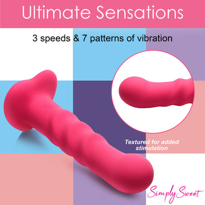 Enhance your playtime with the Simply Sweet Ribbed Dildo, featuring three textured ribs, 3 speeds and 7 patterns of vibration, and a remote control for effortless pleasure. Pink ribbed silicone dildo with vibrations, remote-controlled, harness-compatible suction base, waterproof, body-safe, phthalate-free. Keywords: pink silicone vibrating dildo, ribbed silicone dildo, G-spot vibrator, P-spot vibrator, harness-compatible dildo, suction cup dildo, waterproof vibrating dildo, remote-controlled sex toy, rechar