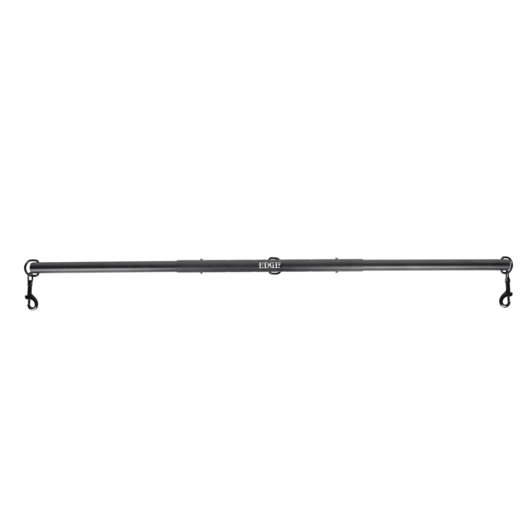 Adjustable aluminum spreader bar with nickel-free hardware, expands 28.5"–37". Includes clips for cuffs, middle attachment, and travel-friendly design.