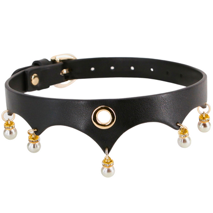 Black collar with gold accents, dangling pearls, and an O-ring centerpiece, made from PU leather and nickel-free hardware, adjustable for neck sizes 11.5 to 16 inches. Keywords: Jezebel Collar, gold accents, dangling pearls, O-ring collar, adjustable collar, PU leather, nickel-free hardware, BDSM collar, luxury bondage collar, elegant day collar, leash compatible, fetish accessories, submissive collar, Fetish & Fashion collar, fashion-inspired BDSM.