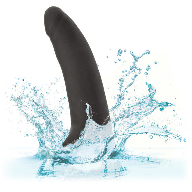 Black or vanilla Accommodator® Silicone Dong with adjustable straps for hands-free oral play. Body-safe, waterproof, and easy to clean. Keywords: Accommodator Silicone Dong, strap-on dildo, hands-free oral play, body-safe silicone, adjustable straps, waterproof, phthalate-free, unisex sex toy, oral stimulation enhancer, intimate couples toy