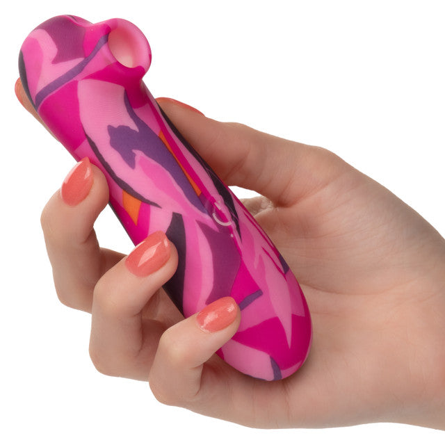 The Naughty Bits® Suck Buddy™ Playful Massager - 
Compact pink and orange clitoral massager with 10 vibration speeds, contoured teaser, and USB rechargeable waterproof design. 
Keywords: clitoral suction vibrator, Naughty Bits collection, compact clitoral toy, waterproof massager, USB rechargeable vibrator, 10-speed clitoral massager, pink and orange suction toy, phthalate-free massager, 