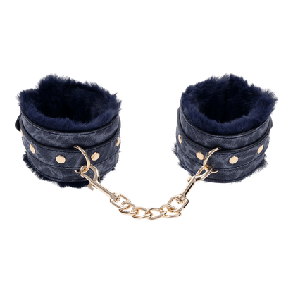 Cougar Fur Handcuffs with soft blue faux fur lining, gold-plated hardware, and adjustable buckle cuffs for elegant bondage play.