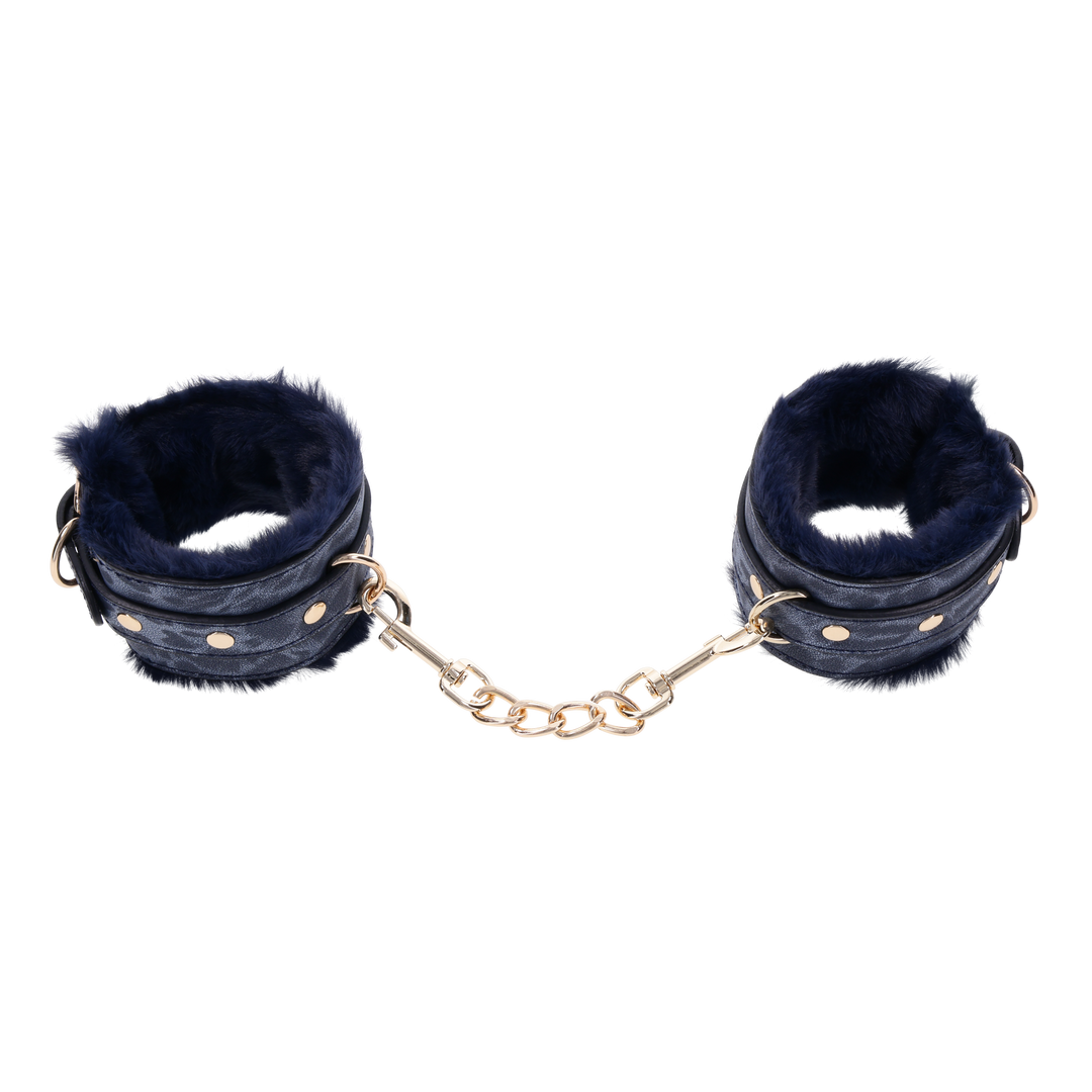 Cougar Fur Handcuffs with soft blue faux fur lining, gold-plated hardware, and adjustable buckle cuffs for elegant bondage play.