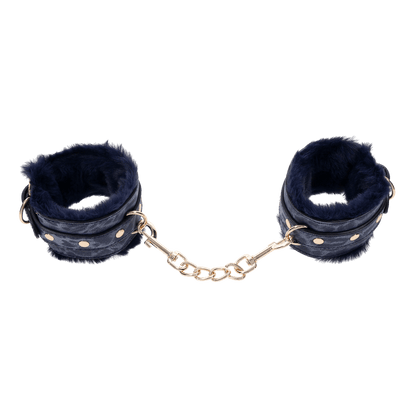 Cougar Fur Handcuffs with soft blue faux fur lining, gold-plated hardware, and adjustable buckle cuffs for elegant bondage play.