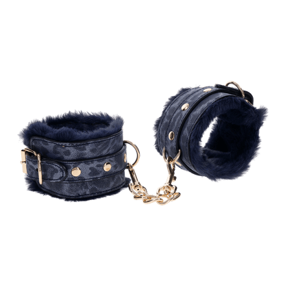 Cougar Fur Handcuffs with soft blue faux fur lining, gold-plated hardware, and adjustable buckle cuffs for elegant bondage play.