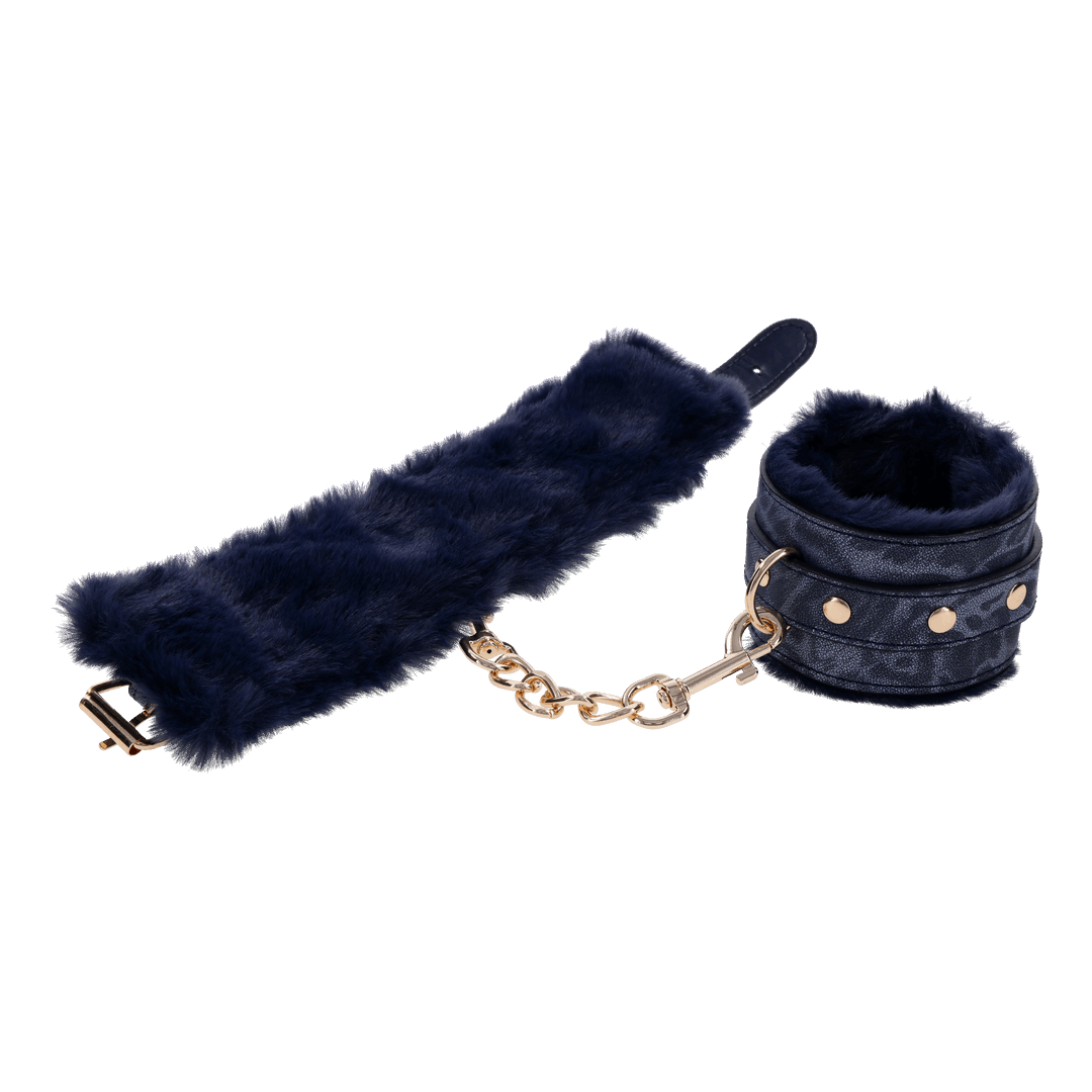 Cougar Fur Handcuffs with soft blue faux fur lining, gold-plated hardware, and adjustable buckle cuffs for elegant bondage play.