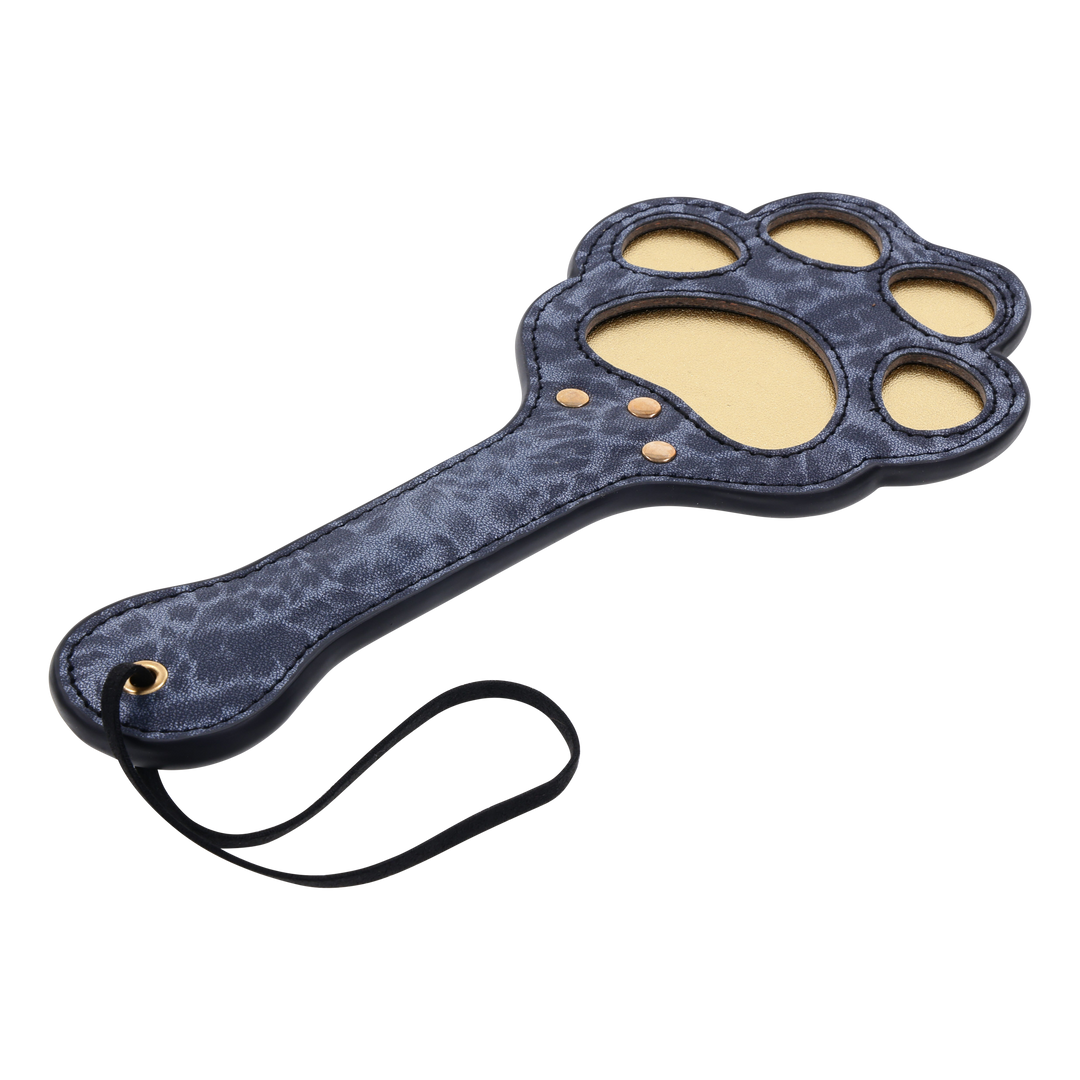 Cougar Paw Paddle with blue leopard faux leather, paw-shaped cutouts, and a wrist loop for playful impact play