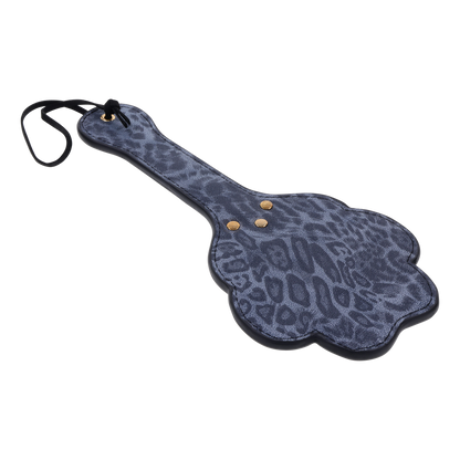 Cougar Paw Paddle with blue leopard faux leather, paw-shaped cutouts, and a wrist loop for playful impact play