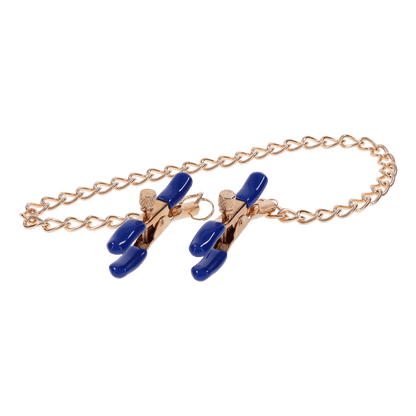 Gold chain nipple clamps with blue tips, adjustable thumb-screws, and removable rubber tips for varied intensity and versatile sensation play