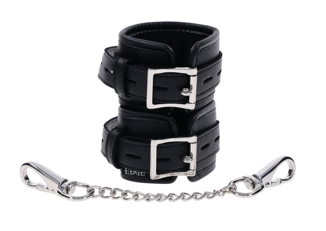 Edge® Handcuffs with padded black design, adjustable buckle closure, and removable metal tether for comfortable and secure BDSM play.