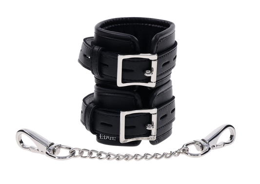 Edge® Handcuffs with padded black design, adjustable buckle closure, and removable metal tether for comfortable and secure BDSM play.