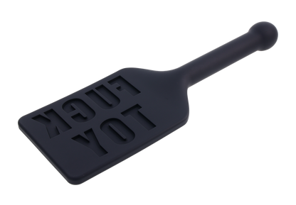 Edge® Silicone Paddle with 'FUCK TOY' imprint, flexible silicone head, and metal-reinforced handle for precision impact play and versatility.