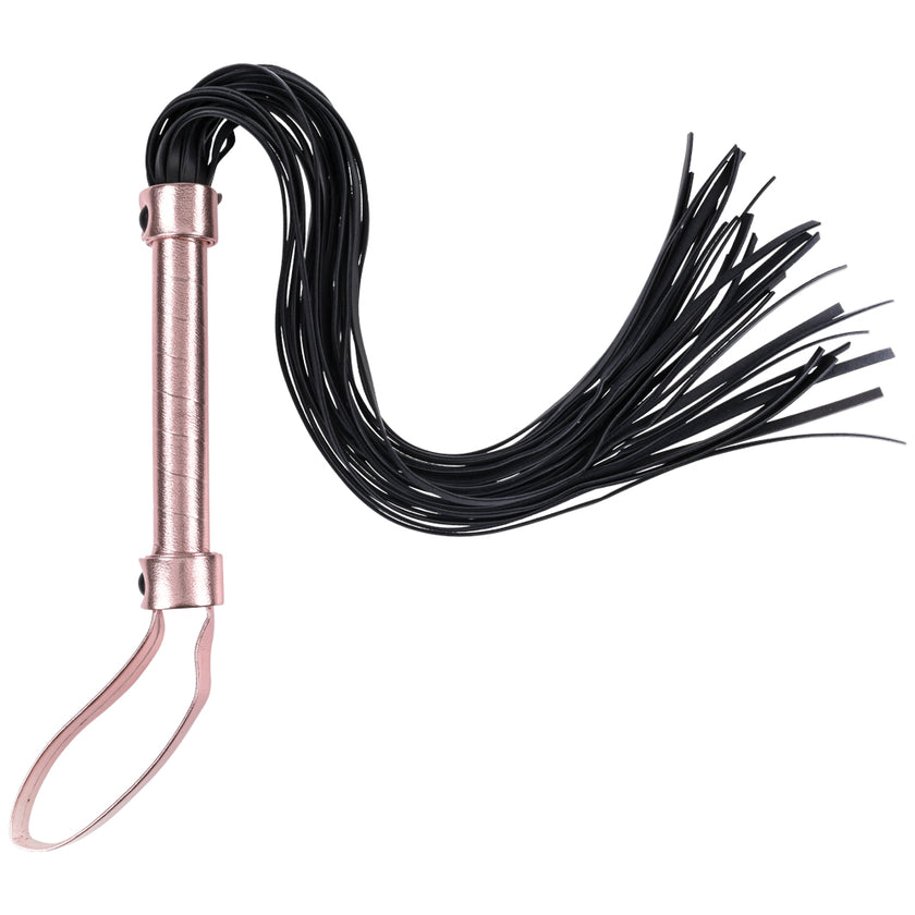 Playfully misbehave with the Brat Flogger, a chic and effective tool for impact play, featuring 30 faux leather falls and a stylish wrist loop.

Keywords: BDSM flogger, faux leather flogger, beginner BDSM toys, Brat Flogger, rose gold flogger, kinky couples accessories, impact play whip, sex toys for couples, BDSM punishment tools, wrist loop flogger.