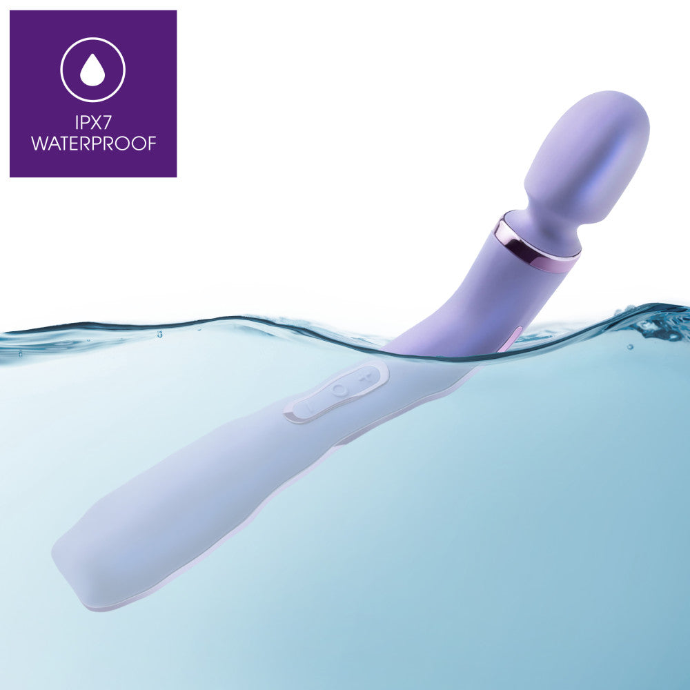 Purple ergonomic massage wand featuring RumbleTech™ vibrations, long handle, and smooth silicone design with a remote control.Keywords: massage wand, RumbleTech wand, ergonomic vibrator, lavender wand, remote control vibrator, waterproof wand, Puria silicone wand, self-care massage wand, rechargeable vibrator, deep tissue massage wand.