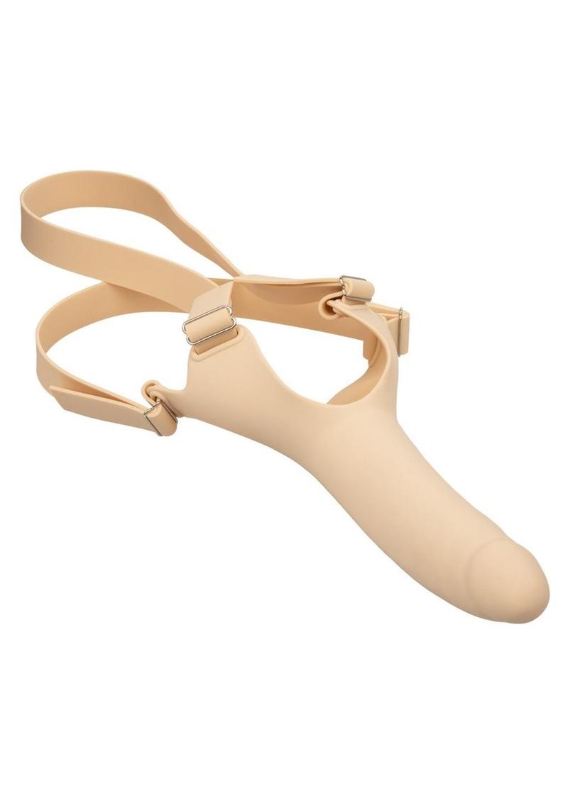 Black or vanilla Accommodator® Silicone Dong with adjustable straps for hands-free oral play. Body-safe, waterproof, and easy to clean. Keywords: Accommodator Silicone Dong, strap-on dildo, hands-free oral play, body-safe silicone, adjustable straps, waterproof, phthalate-free, unisex sex toy, oral stimulation enhancer, intimate couples toy