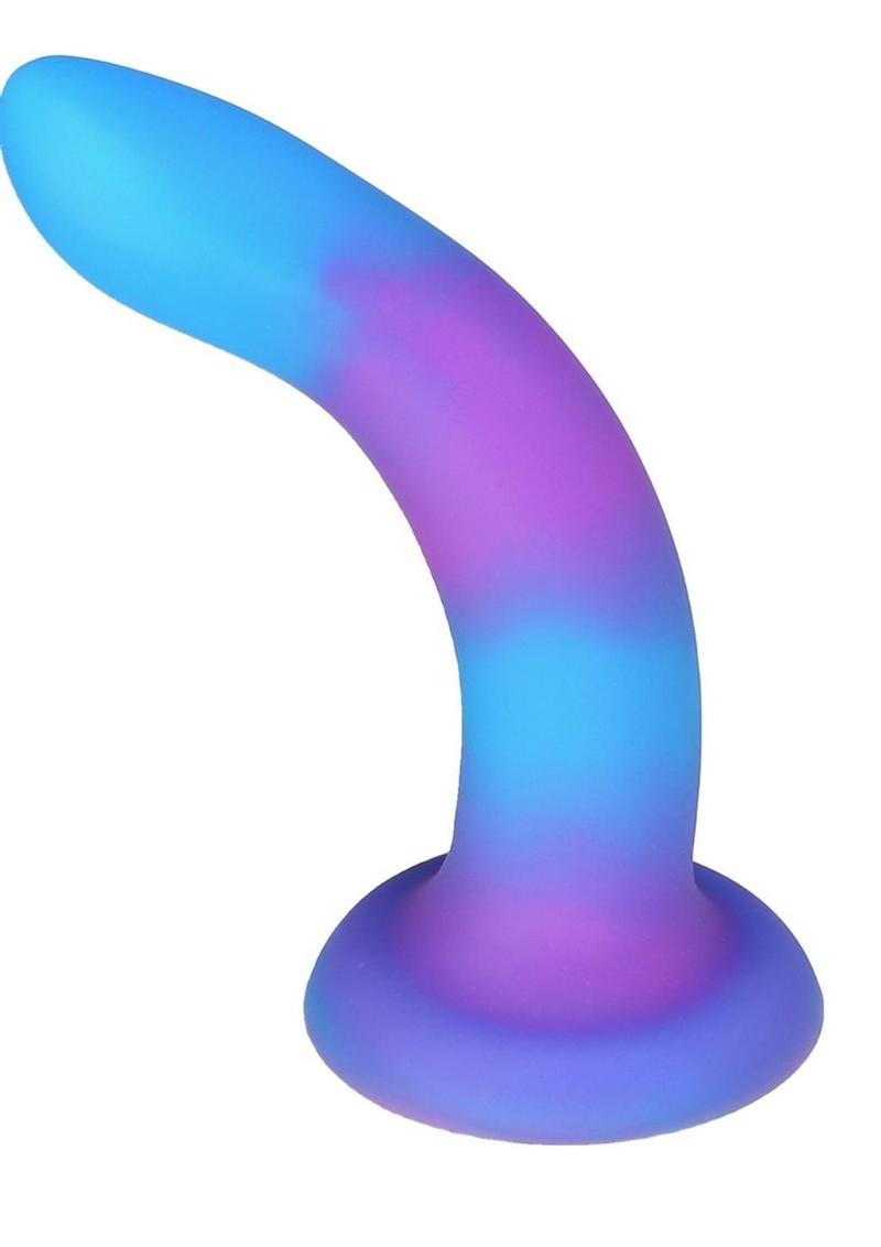 Glow-in-the-dark silicone dildos in vibrant blue, pink, and green colors with a bendable design and strong suction base. Keywords: glow-in-the-dark dildo, bendable silicone dong, vibrant sex toys, strong suction base dildo, harness-compatible toys, premium silicone dildos, rave-themed adult toys, colorful sex toys, party-themed dildos, bonus PowerBullet included.