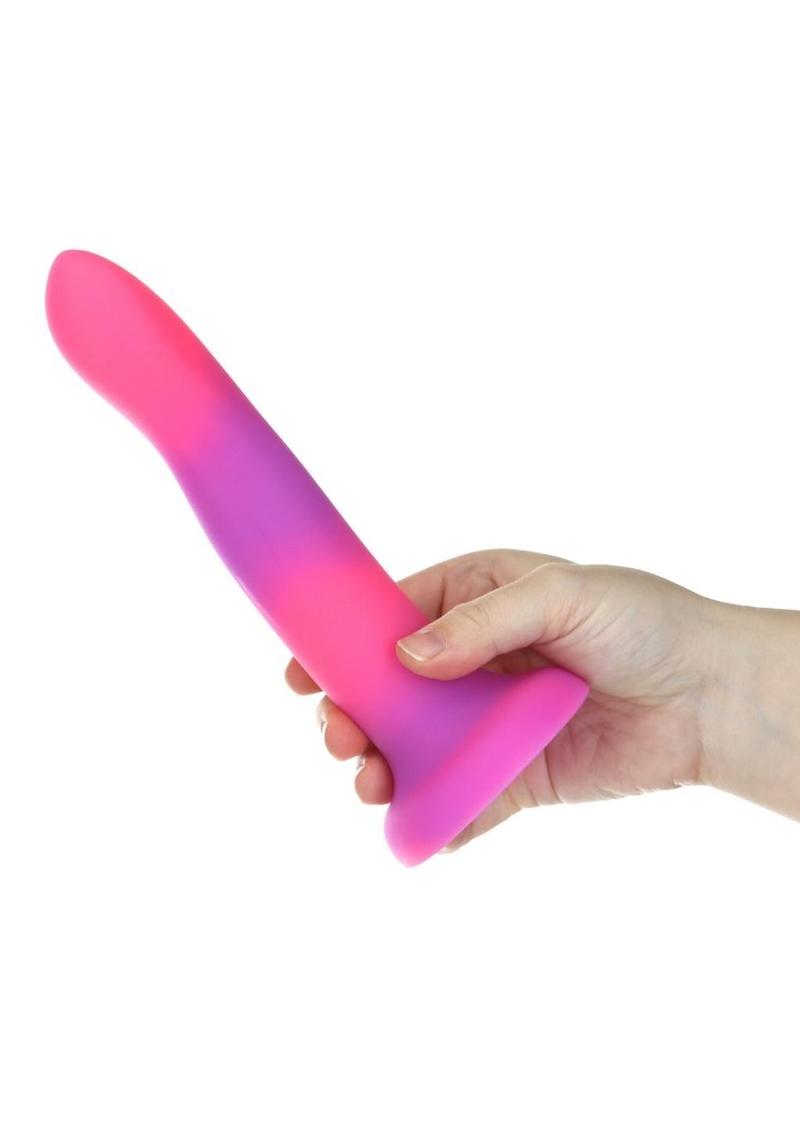 Addiction Rave Silicone Glow In The Dark Dildo - Glow In The Dark/Pink/Purple - 8in Glow-in-the-dark silicone dildos in vibrant blue, pink, and green colors with a bendable design and strong suction base. Keywords: glow-in-the-dark dildo, bendable silicone dong, vibrant sex toys, strong suction base dildo, harness-compatible toys, premium silicone dildos, rave-themed adult toys, colorful sex toys, party-themed dildos, bonus PowerBullet included.