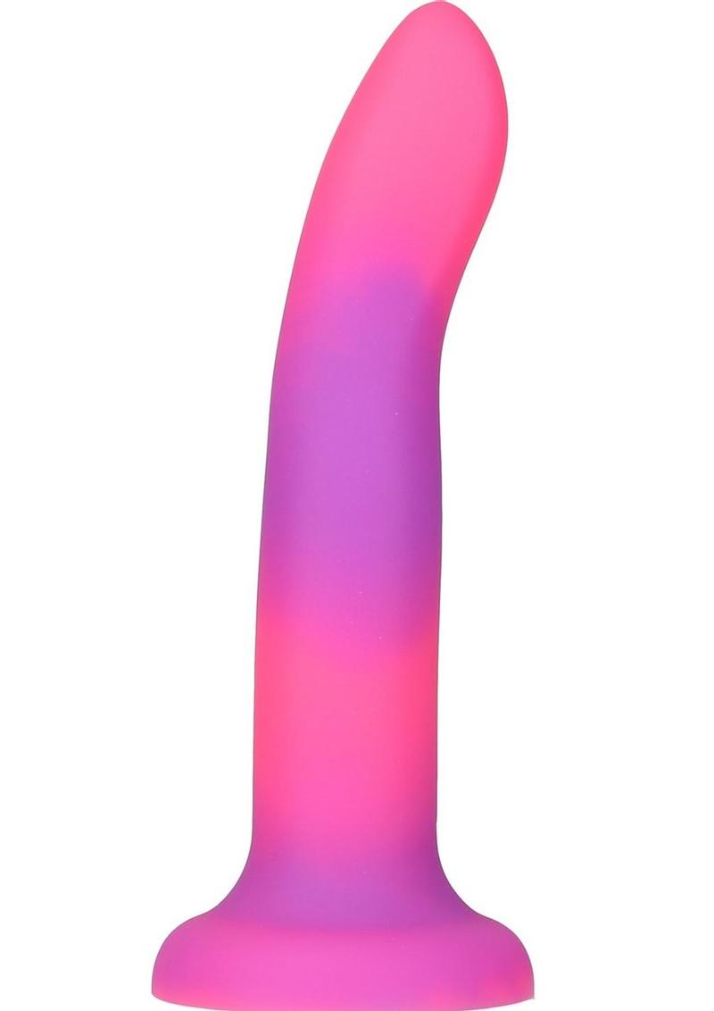 Glow-in-the-dark silicone dildos in vibrant blue, pink, and green colors with a bendable design and strong suction base. Keywords: glow-in-the-dark dildo, bendable silicone dong, vibrant sex toys, strong suction base dildo, harness-compatible toys, premium silicone dildos, rave-themed adult toys, colorful sex toys, party-themed dildos, bonus PowerBullet included.