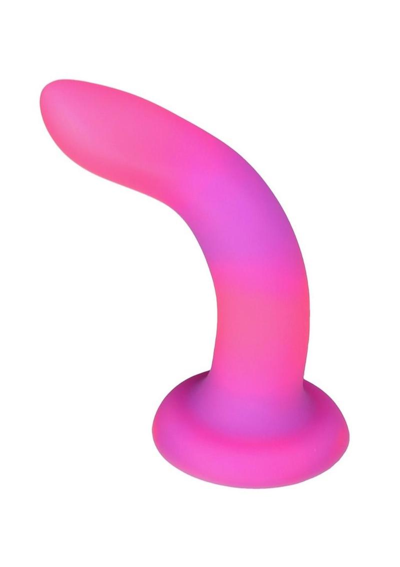 Glow-in-the-dark silicone dildos in vibrant blue, pink, and green colors with a bendable design and strong suction base. Keywords: glow-in-the-dark dildo, bendable silicone dong, vibrant sex toys, strong suction base dildo, harness-compatible toys, premium silicone dildos, rave-themed adult toys, colorful sex toys, party-themed dildos, bonus PowerBullet included.