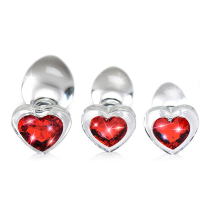 Clear glass anal plug with a red heart-shaped base, available in Small, Medium, or Large, designed for temperature play and smooth, comfortable insertion.

Booty Sparks red heart plug, glass anal plug, heart-shaped anal plug, temperature play anal plug, small glass anal plug, medium glass anal plug, large glass anal plug, red heart butt plug, hypoallergenic anal toy, romantic anal toy