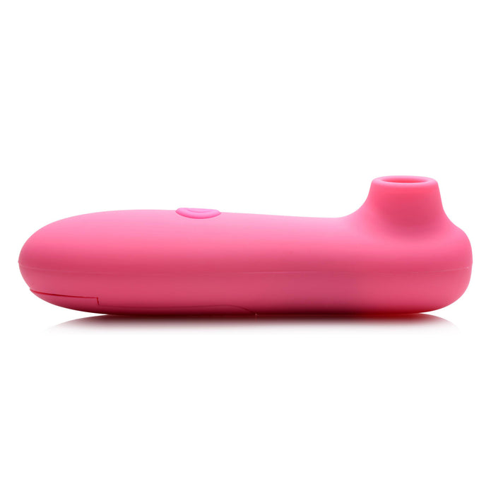 Pink compact clit-sucking toy with 10 suction settings, ergonomic design, velvety silicone finish, and battery-operated functionality.

