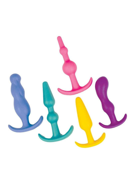 set of five colorful anal plugs in various shapes and sizes, each with an ergonomic design and a flared base for safety. The plugs are shown in blue, pink, teal, yellow, and purple, arranged neatly in a fan-like display.