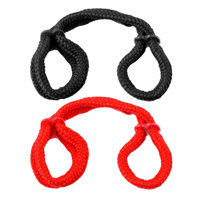 Silk Rope Love Cuffs in black or red with adjustable plastic cinch, ideal for beginners exploring Japanese bondage.
Silk Rope Love Cuffs, Japanese bondage, beginner bondage, silky rope cuffs, black cuffs, red cuffs, adjustable bondage restraints, unisex cuffs, bondage accessories, Fetish Fantasy Series, Pipedream Products.