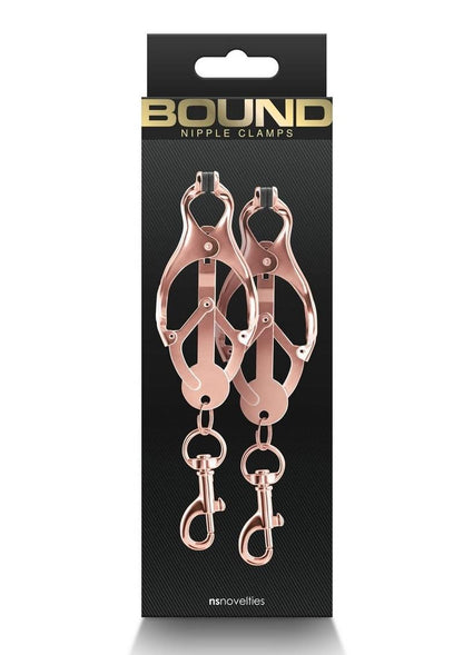 Clover-shaped nipple clamps with pull-to-tighten design, nickel-free metal, and silicone tips for intense stimulation.
 Keywords: clover nipple clamps, pull-tight nipple clamps, nickel-free BDSM clamps, intense nipple play, silicone-tipped clamps, advanced nipple clamps, BDSM accessories, rose gold clamps, gunmetal nipple clamps, luxury nipple play tools.