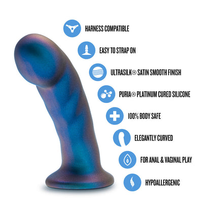 A shimmering blue strap-on-compatible dildo with a curved design, made from body-safe silicone for intermediate-level play.

Keywords: Temptasia Surrender Peg, intermediate pegging dildo, harness compatible, Puria silicone dildo, UltraSilk finish, G-spot stimulation, strap-on play, blue dildo, body-safe silicone, vaginal and anal dildo, intermediate-level toy