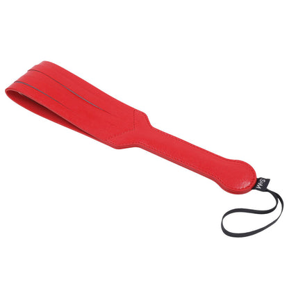 Red vegan leather paddle with looped strands and a wrist strap, designed for impactful strikes and versatile BDSM play.

