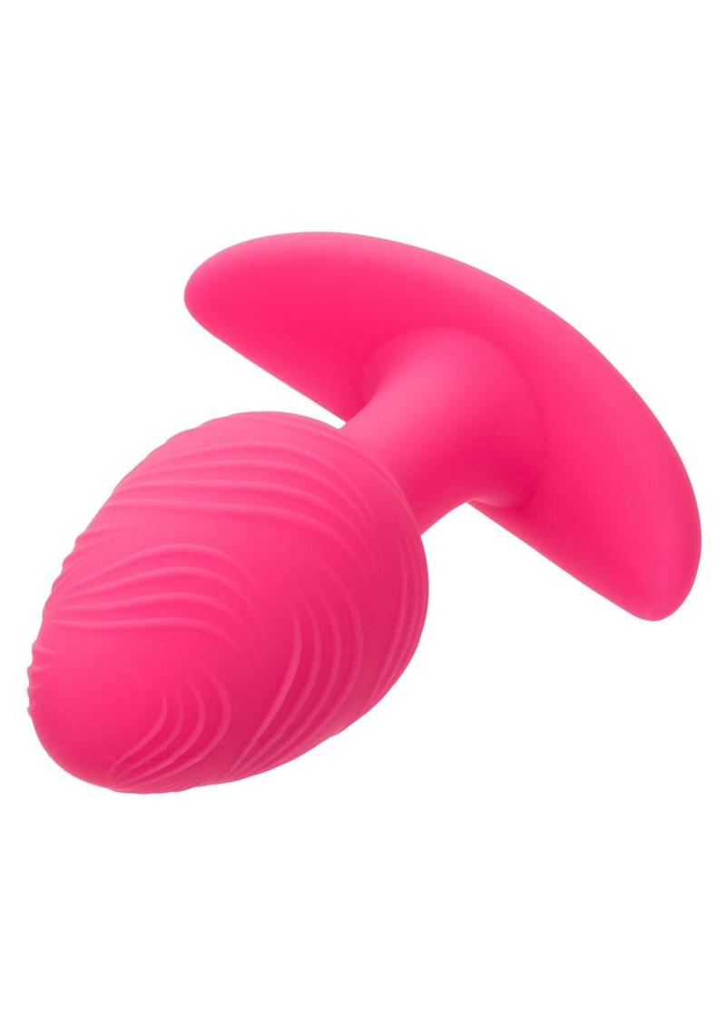 Cheeky Rechargeable Silicone Glow In The Dark Anal Butt Plug featuring 10 vibration speeds and a textured design for enhanced sensations. Waterproof (IPX7), USB rechargeable, and travel-friendly with a secure lock. Insertable length: 3.5 inches. Perfect for adventurous play!