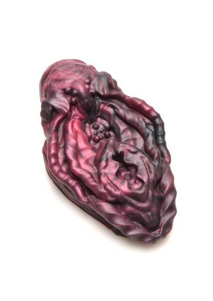 Squishy red and black alien vulva grinder with textured design for non-penetrative pleasure.

Xeno vulva, alien vulva grinder, non-penetrative pleasure, textured grinder, fantasy pleasure toy, red and black vulva, squishy silicone toy, body-safe silicone, phthalate-free grinder, erogenous zone toy, water-based lube friendly, alien roleplay toy