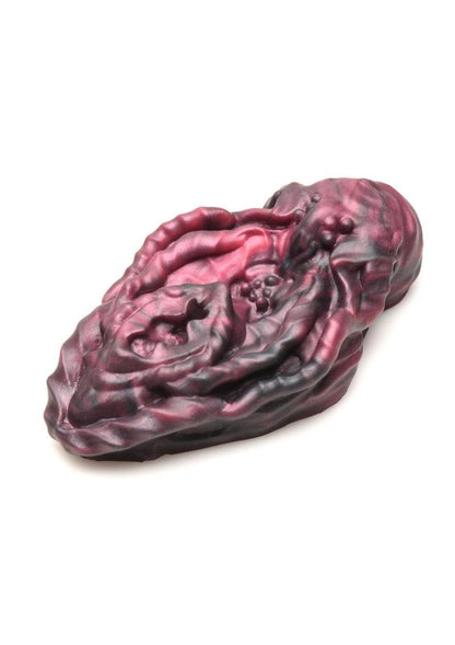 Squishy red and black alien vulva grinder with textured design for non-penetrative pleasure.

Xeno vulva, alien vulva grinder, non-penetrative pleasure, textured grinder, fantasy pleasure toy, red and black vulva, squishy silicone toy, body-safe silicone, phthalate-free grinder, erogenous zone toy, water-based lube friendly, alien roleplay toy