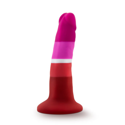 Lesbian pride-colored silicone dildo with a petite design, straight shaft, and suction base, made from smooth Purio™ silicone. Keywords: lesbian pride dildo, Avant dildo, petite dildo, beginner-friendly dildo, suction cup dildo, harness-compatible dildo, body-safe silicone dildo, colorful pride dildo, Purio silicone, artisan-crafted dildo.
