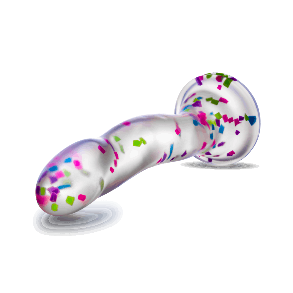 Glow-in-the-dark dildo with neon confetti, crafted from body-safe Purio™ silicone, featuring a curved design, suction base, and playful visual appeal. 
Keywords: glow-in-the-dark dildo, confetti dildo, silicone dildo, suction cup dildo, harness-compatible dildo, body-safe dildo, Purio silicone, G-spot dildo, P-spot dildo, fun adult toy. 