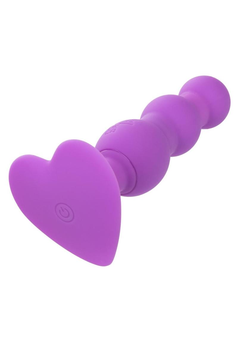 First Time Triple Beaded Silicone Rechargeable Probe - Purple A close-up of the probe showing the beaded design and its smooth silicone finish, emphasizing the size and beaded texture for pleasure.