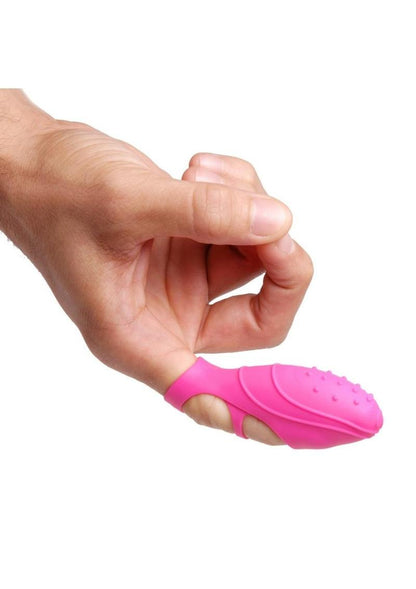 Pink vibrating finger stimulator made of premium silicone with textured surface, stretchy loops, and push-button control. 
Vibrating Finger Stimulator, clit stimulator, G-spot vibrator, compact vibrator, textured silicone vibe, premium silicone, battery-powered vibrator, vibrating sex toy, finger vibrator, discreet vibe, ergonomic design.