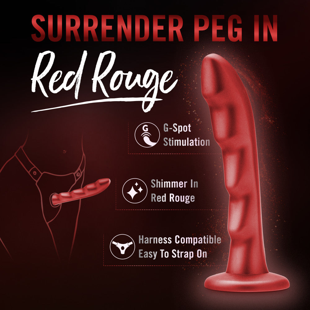 A red strap-on-compatible dildo with a curved design and ridges for G-spot pleasure. Made from body-safe silicone for versatile and comfortable play.
Keywords: Temptasia Jealousy Peg, red dildo, harness-compatible dildo, G-spot stimulation, strap-on play, ridged dildo, Puria silicone, UltraSilk finish, pegging dildo, body-safe silicone, vaginal and anal toy