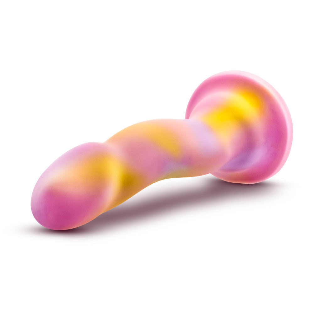 Vibrant pink and yellow silicone dildo with a curved design, suction base, and smooth finish, ideal for G-spot and P-spot play.
Keywords: curved dildo, Avant dildo, G-spot dildo, P-spot dildo, suction cup dildo, harness-compatible dildo, body-safe silicone dildo, Ultrasilk dildo, bright colorful dildo, artisanal sex toy.